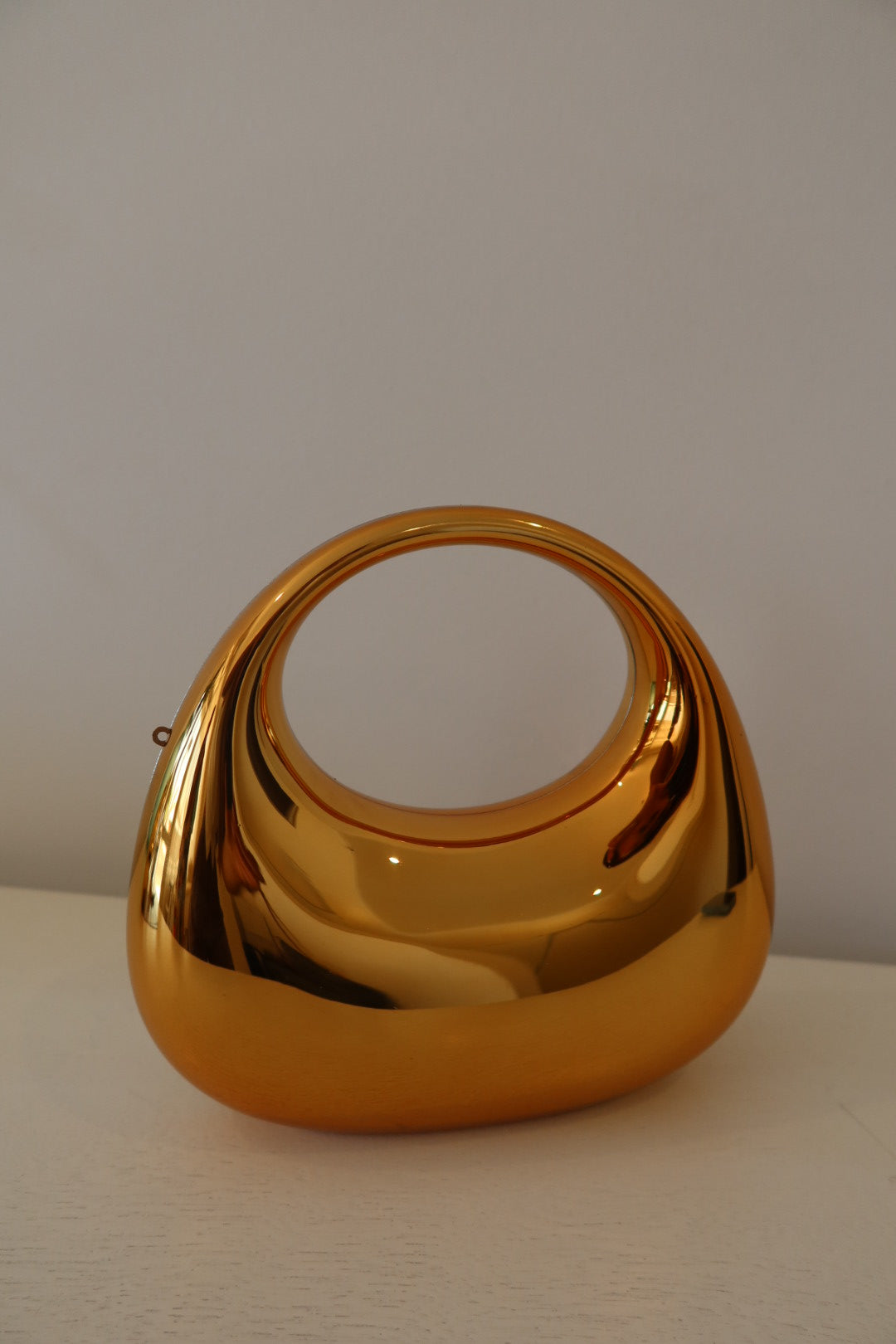 Gold bag with handle